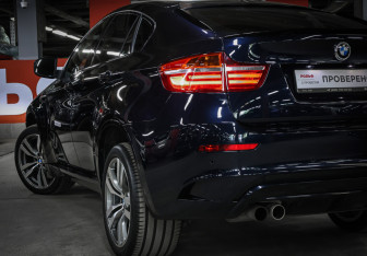 Подержанный автомобиль BMW X6 M 2013 года (29 фото)