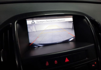 Подержанный автомобиль Opel Astra Hatchback 2013 года (16 фото)