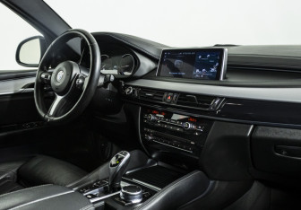 Подержанный автомобиль BMW X6 2017 года (9 фото)