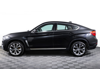 Подержанный автомобиль BMW X6 2014 года (8 фото)