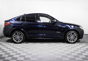 Подержанный автомобиль BMW X4 2018 года (4 фото)