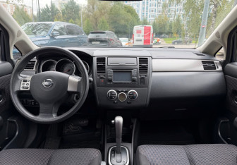 Подержанный автомобиль Nissan Tiida Sedan 2012 года (7 фото)