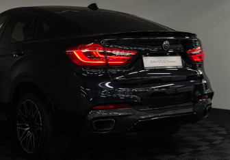 Подержанный автомобиль BMW X6 2018 года (19 фото)