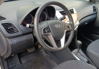 Подержанный автомобиль Hyundai Solaris Sedan 2015 года (13 фото)