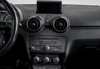 Подержанный автомобиль Audi A1 2014 года (4 фото)
