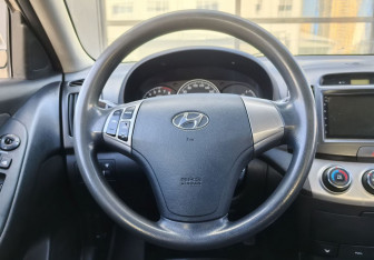 Подержанный автомобиль Hyundai Elantra Sedan 2010 года (14 фото)