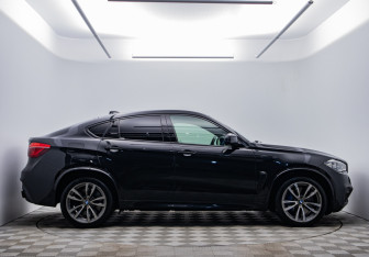 Подержанный автомобиль BMW X6 2014 года (6 фото)