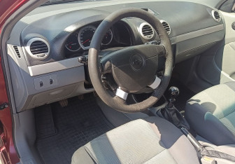 Подержанный автомобиль Chevrolet Lacetti Hatchback 2008 года (14 фото)