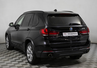 Подержанный автомобиль BMW X5 2014 года (7 фото)