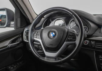 Подержанный автомобиль BMW X6 2015 года (15 фото)
