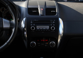 Подержанный автомобиль Suzuki SX4 Hatchback 2010 года (11 фото)