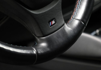 Подержанный автомобиль BMW X6 M 2013 года (18 фото)