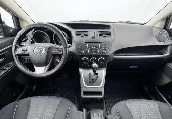 Подержанный автомобиль Mazda 5 2011 года (9 фото)