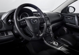 Подержанный автомобиль Mazda 6 Sedan 2009 года (14 фото)