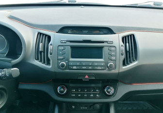 Подержанный автомобиль Kia Sportage 2012 года (15 фото)