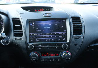 Подержанный автомобиль Kia Cerato Coupe 2013 года (14 фото)