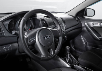 Подержанный автомобиль Kia Cerato Sedan 2011 года (14 фото)