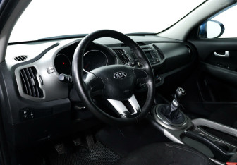 Подержанный автомобиль Kia Sportage 2014 года (9 фото)