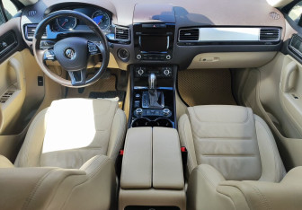 Подержанный автомобиль Volkswagen Touareg 2014 года (10 фото)