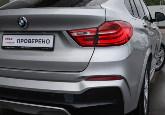 Подержанный автомобиль BMW X4 2016 года (23 фото)