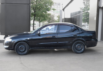 Подержанный автомобиль Nissan Almera Classic 2008 года (8 фото)