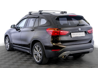 Подержанный автомобиль BMW X1 2017 года (7 фото)