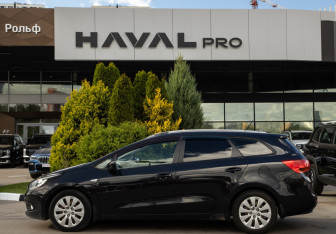 Подержанный автомобиль Kia Ceed Wagon 2014 года (6 фото)