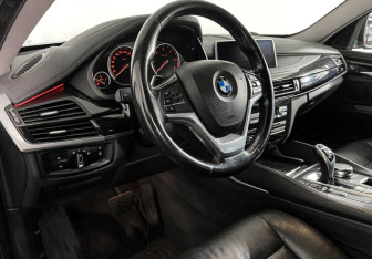 Подержанный автомобиль BMW X6 2018 года (12 фото)
