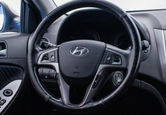 Подержанный автомобиль Hyundai Solaris Sedan 2015 года (15 фото)