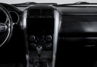 Подержанный автомобиль Suzuki Grand Vitara 2010 года (13 фото)