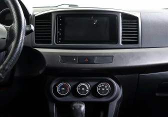 Подержанный автомобиль Mitsubishi Lancer Sedan 2013 года (13 фото)