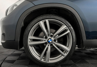 Подержанный автомобиль BMW X1 2014 года (7 фото)