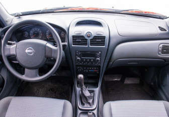 Подержанный автомобиль Nissan Almera Classic 2007 года (13 фото)