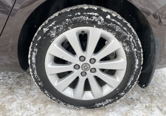 Подержанный автомобиль Opel Astra Wagon 2012 года (10 фото)