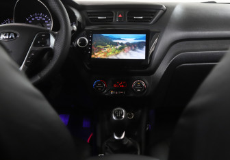Подержанный автомобиль Kia Rio Sedan 2015 года (6 фото)