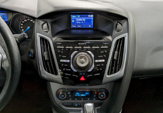 Подержанный автомобиль Ford Focus Wagon 2014 года (23 фото)