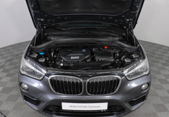Подержанный автомобиль BMW X1 2017 года (10 фото)