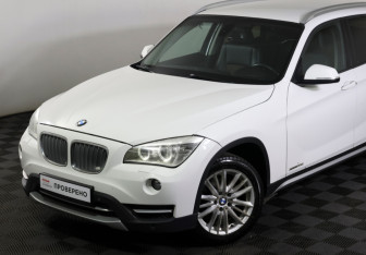 Подержанный автомобиль BMW X1 2013 года (22 фото)