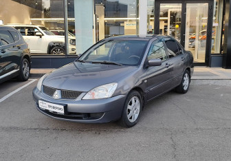 Подержанный автомобиль Mitsubishi Lancer Sedan 2005 года (1 фото)
