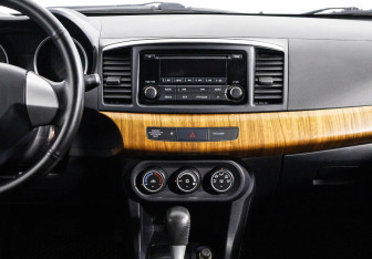 Подержанный автомобиль Mitsubishi Lancer Sedan 2014 года (8 фото)