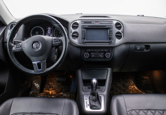 Подержанный автомобиль Volkswagen Tiguan 2014 года (13 фото)