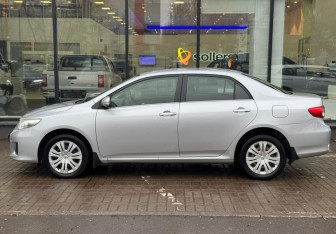Подержанный автомобиль Toyota Corolla Sedan 2011 года (5 фото)
