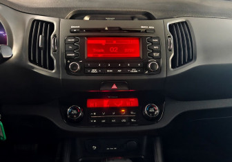 Подержанный автомобиль Kia Sportage 2013 года (13 фото)