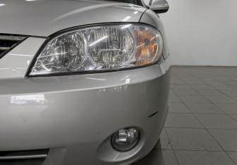 Подержанный автомобиль Kia Spectra Sedan 2007 года (13 фото)