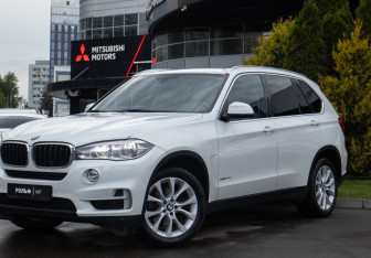 Подержанный автомобиль BMW X5 2017 года (22 фото)