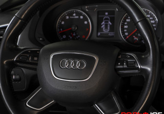 Подержанный автомобиль Audi Q3 2015 года (14 фото)