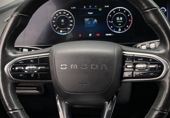 Подержанный автомобиль Omoda C5 2023 года (14 фото)