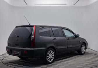 Подержанный автомобиль Mitsubishi Lancer Wagon 2006 года (5 фото)