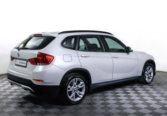 Подержанный автомобиль BMW X1 2014 года (5 фото)