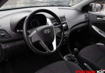 Подержанный автомобиль Hyundai Solaris Hatchback 2014 года (10 фото)